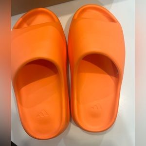 Yeezy by adidas slides.